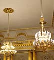 Gilded columns and chandeliers